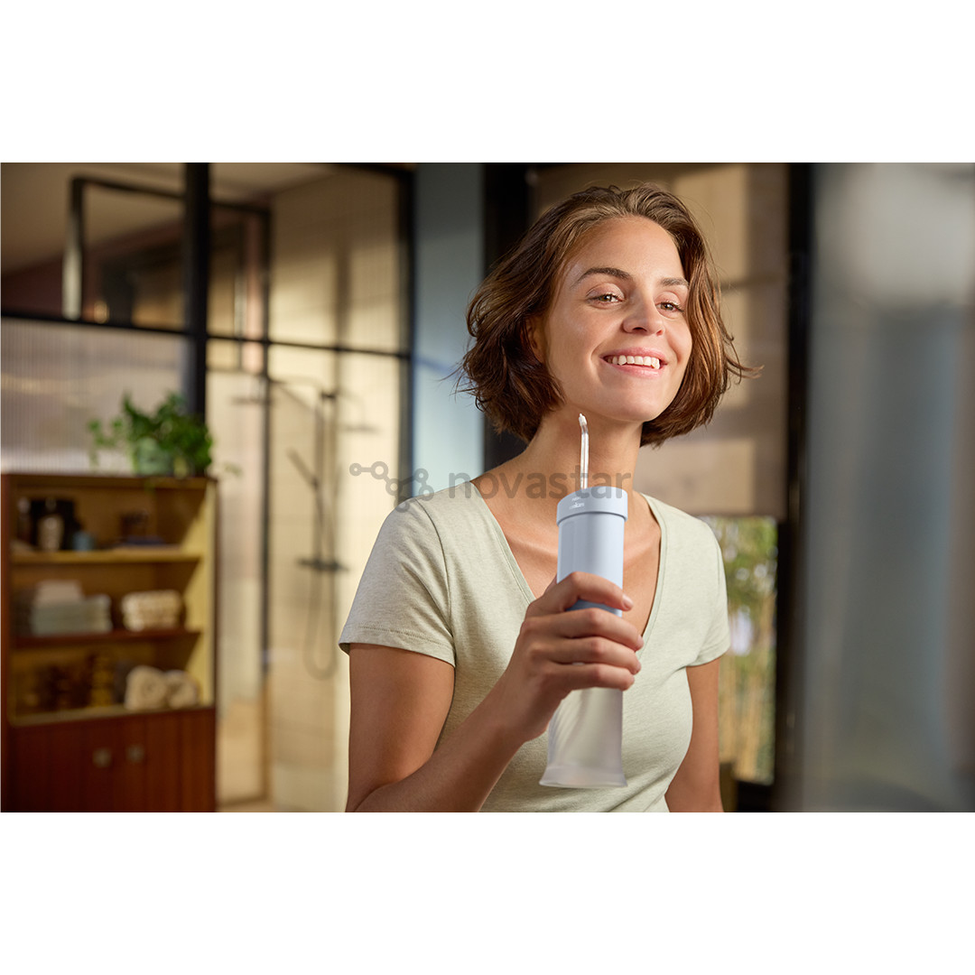 Philips Sonicare Compact Flosser 1000, голубой - Ирригатор